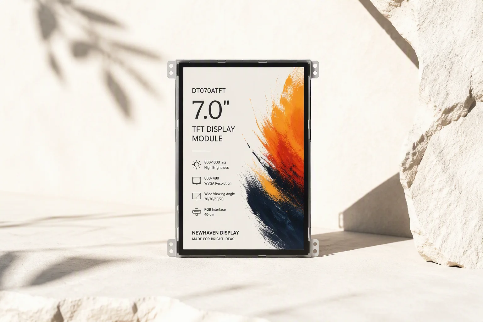 Display module in direct harsh sunlight outdoors, screen clearly visible with vivid abstract content