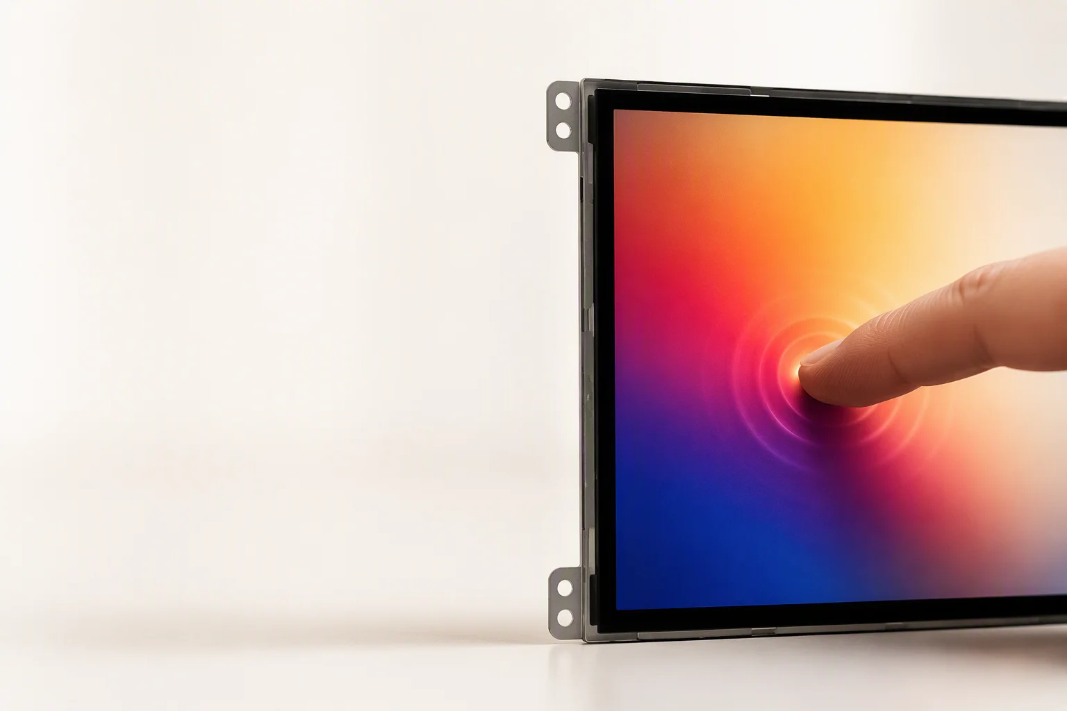 Finger touching a capacitive touch display with a ripple effect and abstract colorful gradient on screen